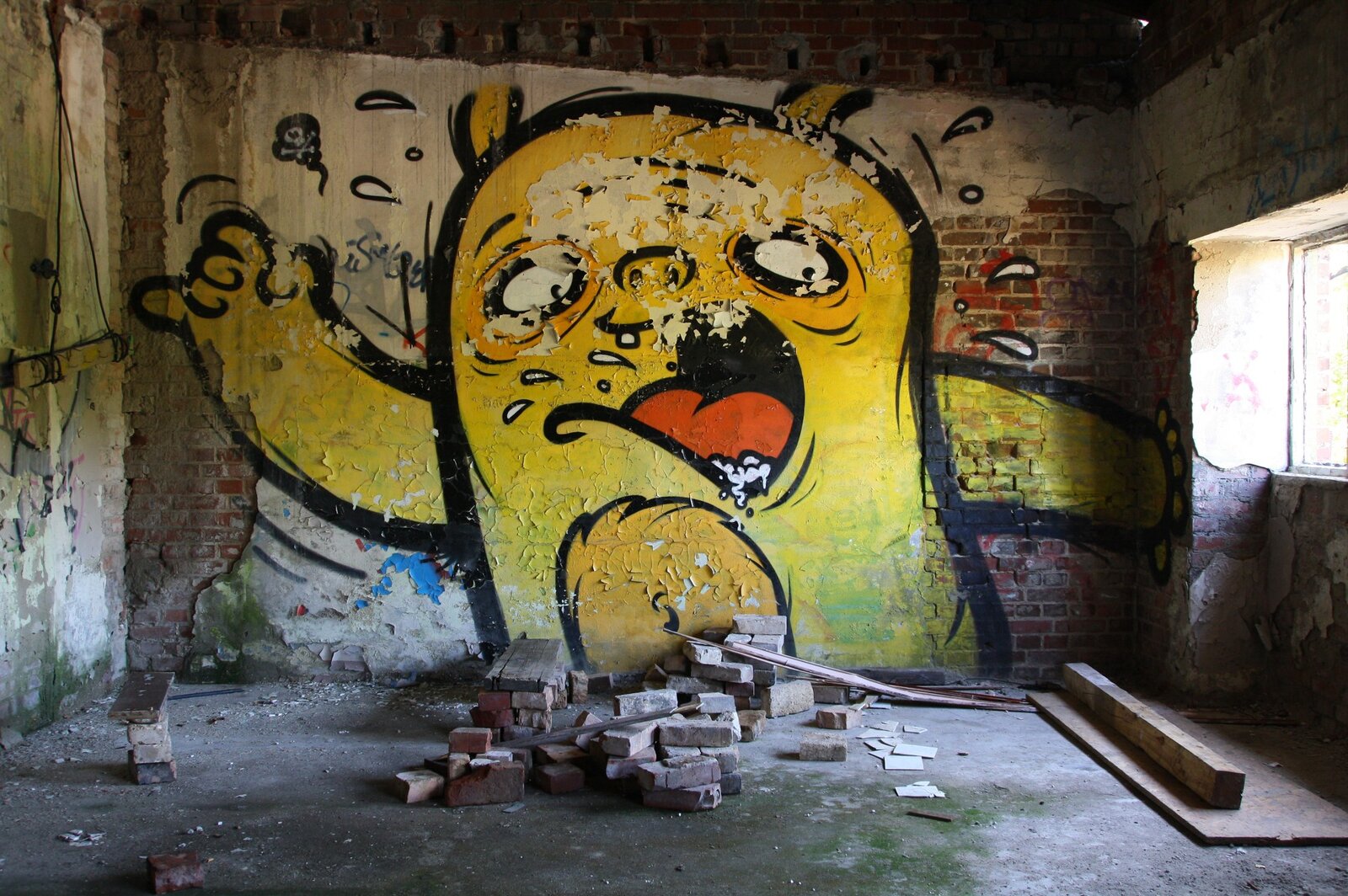Graffiti, bildlich: Gelber Steinspucker